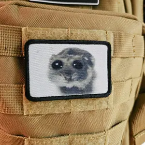Sad hamster meme 2"x3" removable morale patch with hook and loop backing