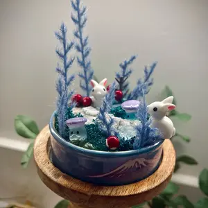 Mini world love bunnies in winter wonderland. Tiny and cute perfect home decor