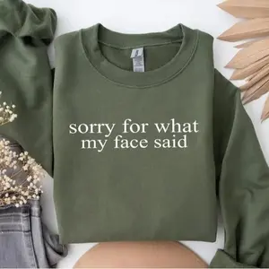 “Sorry For What My Face Said” sweatshirt, a sarcastic and funny crewneck, perfect for casual wear and showing off your witty, playful personality in style.