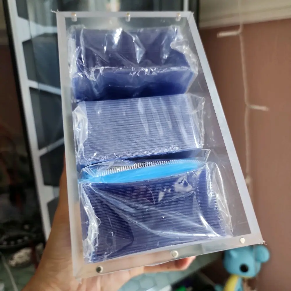 Acrylic cases for Pokemon Booster Box with UV protection and secure magnetic lid. 75 toploaders and one pack of 100 sleeves
