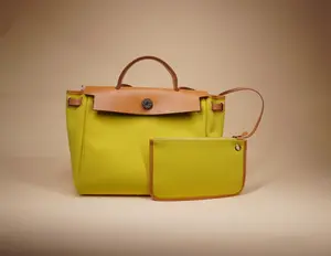 Pre-owned HERMÈS Canvas Shoulder Bags HERMES Toile H Berline Vache Hunter Herbag Zip 31 PM Lime