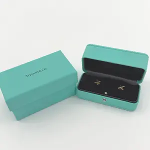 Pre-owned Tiffany & Co. 18K yellow gold "X" earring from the Paloma Picasso collection for Tiffany & Co with Box