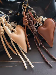 Sweet and retro style woven tassel heart-shaped pendant, fashionable and exquisite style personalized pearl necklace, lightweight and easy to carry, can be used as a bag hanger and keychain, suitable for dating, commuting, shopping