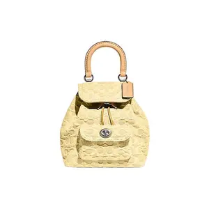COACH Riya 21 Monogram-Embossed Classic Caramel Canvas Backpack for Women, Medium, Yellow