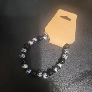 Tourmaline bead and painted glass bracelet