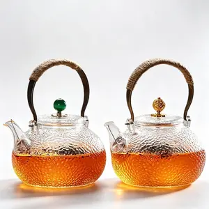 700ml hammered glass teapot with copper handle heat-resistant explosion-proof and high-temperature-resistant  high borosilicate glass home-made tea glass pot for women’s beauty scented tea   fruit tea