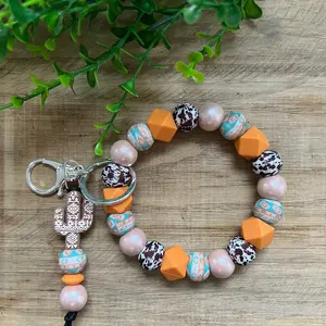 Aztec cactus keychain charm with brown cow print Wristlet Metal Coating Metal Coating Metal Coating