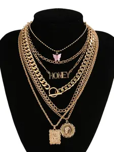 7-Piece Gold Layered Y2K Necklace Set with 'HONEY' Letter, Butterfly & Coin Charms | Edgy Chic Accessory for Daily, Party & Music Festival Looks Layered Necklaces