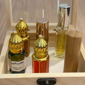 Wooden  gift  box for occasions containing six different fragrances . Three of them pomegranate musk rose  musk and snow  musk along with three alcohol  free oil perfumes all of which  are refreshing and long last ting