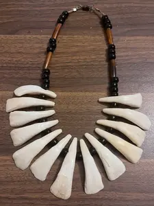 Vetiver Artist Life Tiki Animal Teeth Jewelry, Handmade Beaded Buffalo Coyote Teeth Bone Necklace for Halloween and Gothic Parties