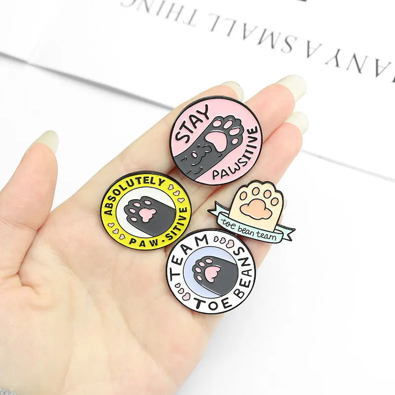 Cartoon Caring Cat Paw Dog Paw Badge