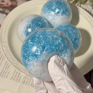 A Blue Glacier Hand Exercise Ball, Suitable for Children And Adults, Is a Slow-Rebound Sensory Toy That Helps Vent Emotions And Improve Focus. This Soft Ball Is a Stress-Relief Ball for Gripping, Stretching, And Is Ideal for Kids, Teens, And Adults
