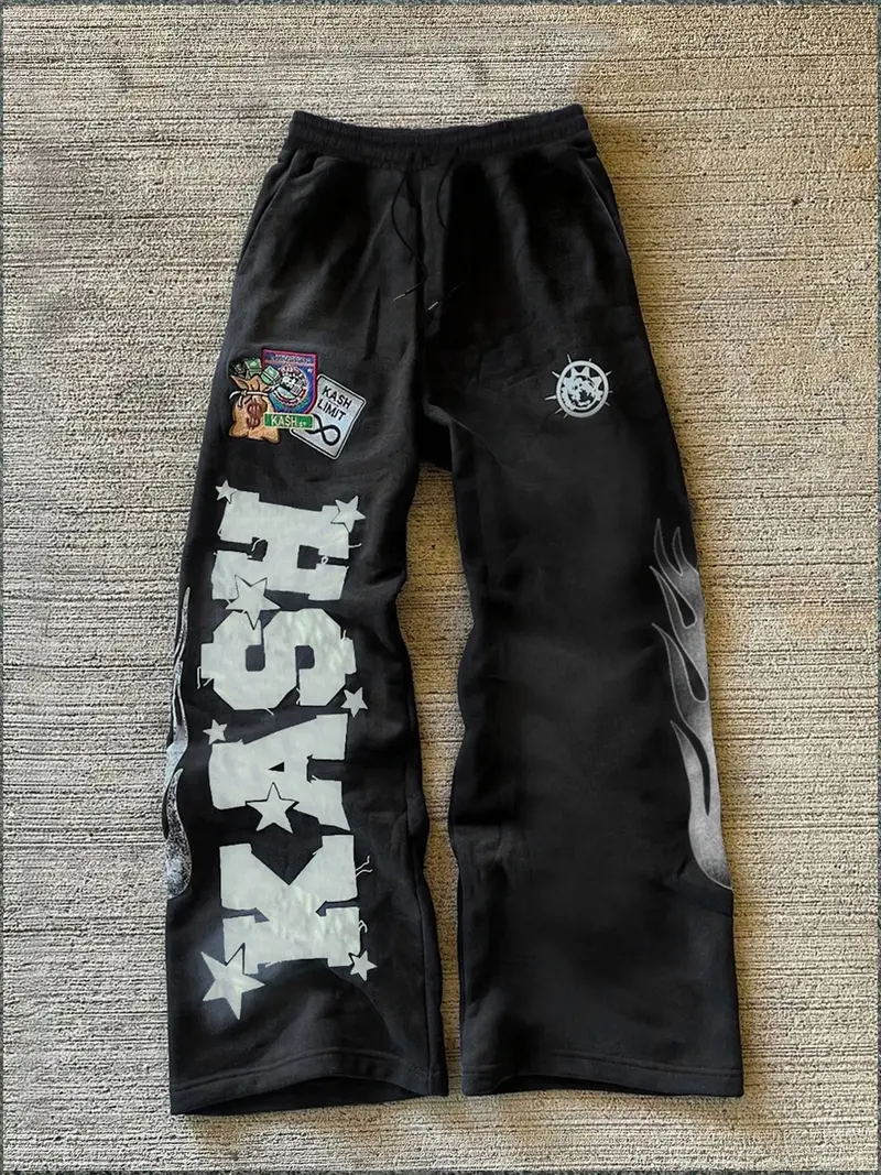 Trendy Black Fleece - lined Sweatpants with "KASH" Lettering, Star and Flame Graphics, Ideal for Street - style and Hip - hop Wear, Trending on TikTok #Sweatpants #StreetFashion #TikTokTrend, Sports Casual Pants