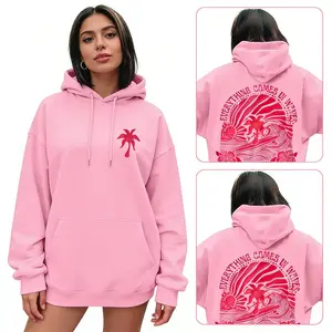 Women Hoodie Inspired by French Style Featuring a Surfing Graphic That Highlights The Ocean This White And Blue Nautical Pullover Includes French Text And a Wave Print