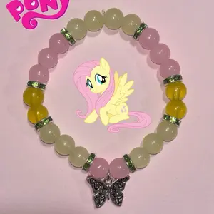 My Little Pony Fluttershy Beaded Bracelet with Beads in Pink, Yellow, and Green, Featuring Character Design and Butterfly Charm