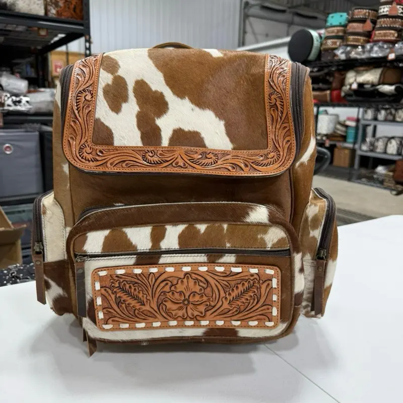 Genuine hand tooled leather & cowhide backpack