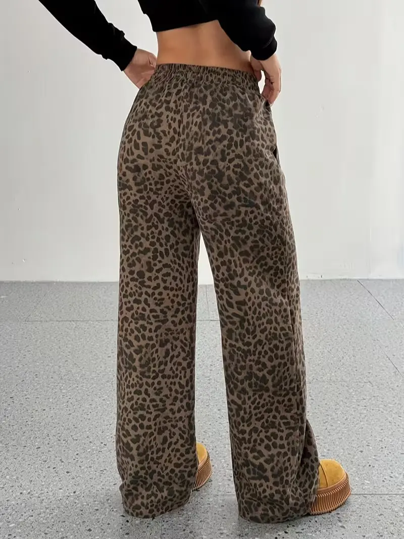 Women’s street-style retro leopard-print casual sweatpants with an elastic waistband, wide straight legs that touch the ground, and a fluid drape—versatile for everyday wear. backtoschoolshopping