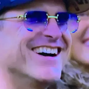 Turnover Buffs Sunglasses - The Product Image Showcases Coach Jim Harbaugh wearing them.