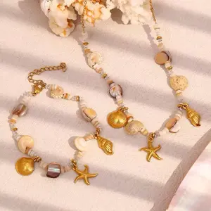 Stainless Steel Beach Pendant Necklace and Bracelet with Seashells Starfish Charms & Gold Accents