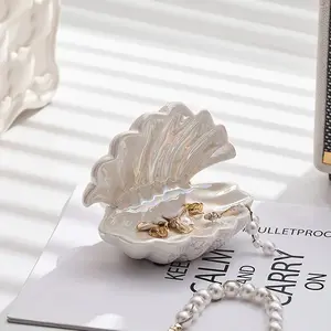 Elegant Shell Jewelry Tray doubles as key and beauty supplies organizer. It neatly holds necklaces, earrings and daily small items. Stylish decorative craft for entryway decor, bedroom arrangement and vanity table ornament.