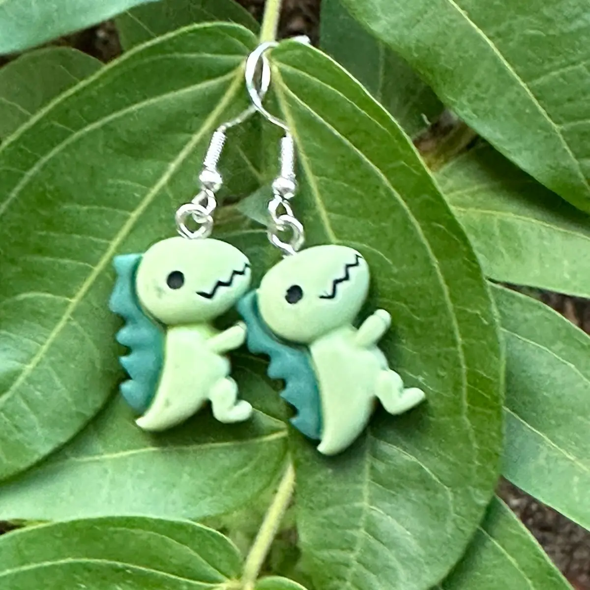 Cute dinosaur earrings great for any function.