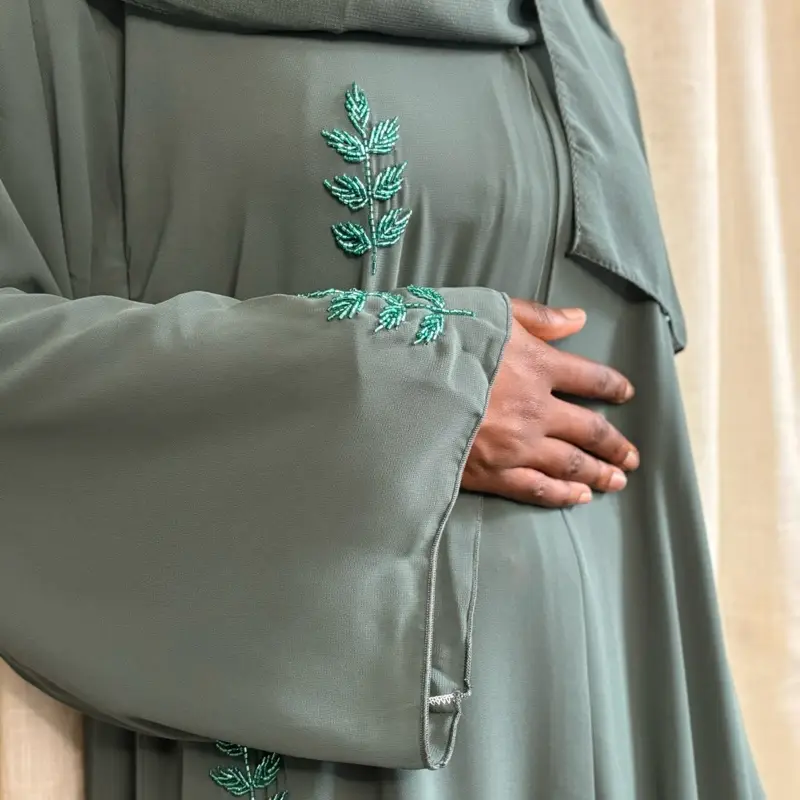 Aina Sage Green Open Abaya with Green Embroidered Leaf Design on Sleeves