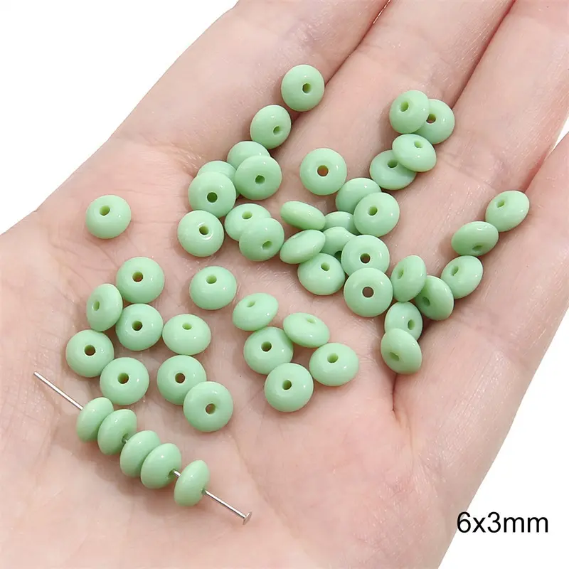 Solid color round beads 6x3mm, green