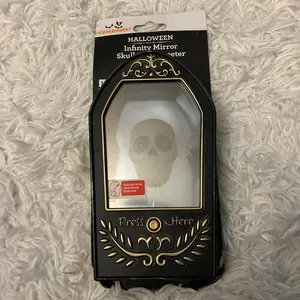 Animated Halloween Infinity Mirror Skull Door Greeter Talks and Eyes Light up