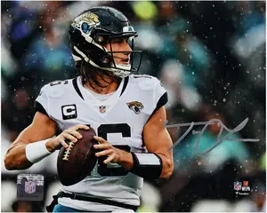 Trevor Lawrence Jacksonville Jaguars Autographed 8" x 10" In the Rain Photograph - Fanatics Authentic Certified