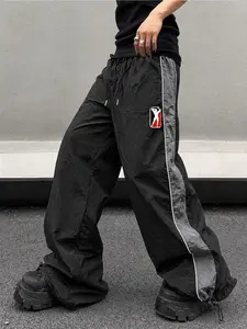 Men’s basketball-style street jogger pants with color-block panels; summer loose fit with drawstring; basketball logo athletic joggers; relaxed wide-leg design; versatile sports style.