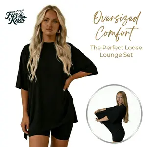 Women’s summer crewneck two-piece loungewear set, ideal for home relaxing. Features an oversized split-hem top and biker shorts with side pockets. Made of soft viscose, it’s lightweight and easy to care for.