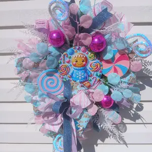 Gingerbread Candyland Wreath with Colorful Gingerbread Man, Lollipops, and Decorative Elements for Festive Decoration