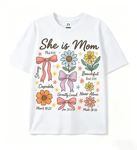 She is Mom Shirt, Christian Mom Bible Verse Tee, Flower Bow Mom Graphic Shirt, Mother's Day Mom Gift, Cute New Mom Christian Tee, Mom Affirmation Floral Tee, Romantic Coquette Mom Shirt, Christian Mom 2026 Gift, Strong Beautiful Mom Tee