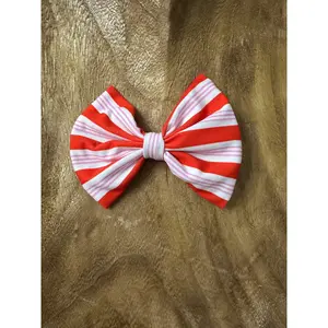 Red and pink striped clip on bow