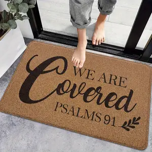 A Doormat Featuring a Bible Verse from Christian Faith, Stating "We Are Covered". This Non-Slip, High-Quality Mat Is Designed for Both Indoor And Outdoor Use