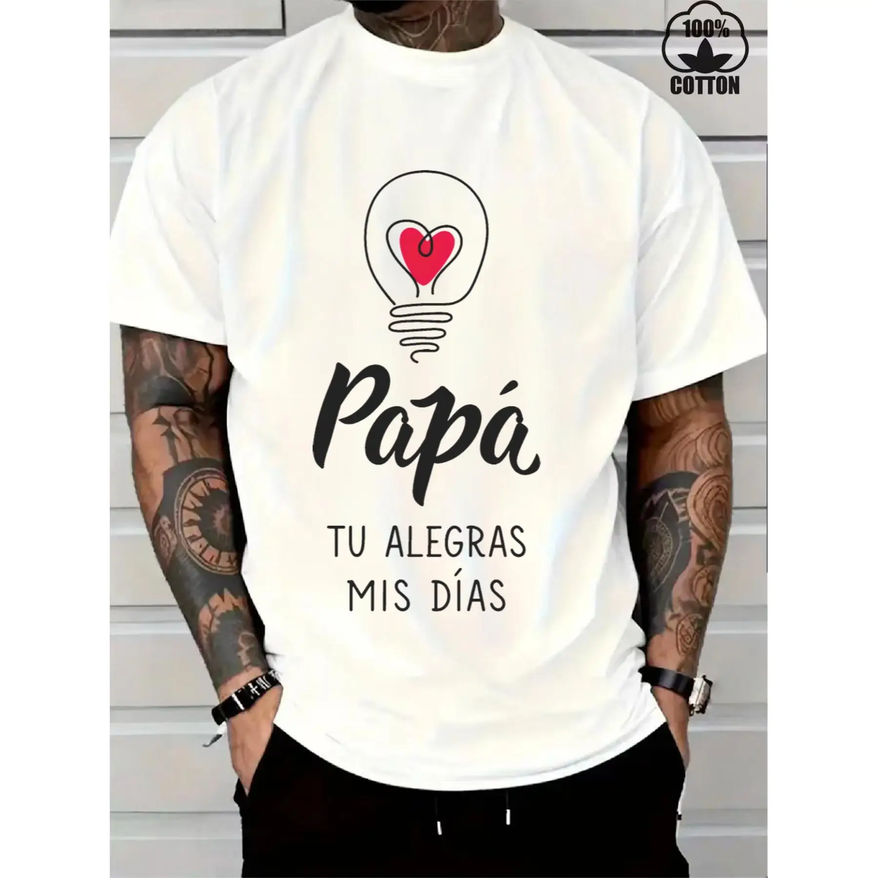 T - Shirt Celebrating Fathers: Heart - in - Bulb Graphic with Spanish Phrase 'Papa, tu alegras mis dias' for a Loving Vibe