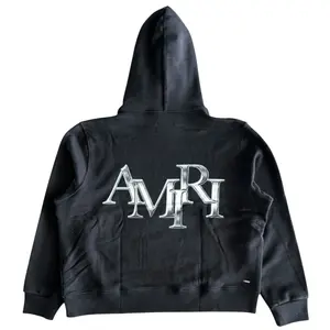 Amiri Staggered Logo Hooded Sweatshirt Black Chrome