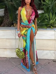 Trendy women’s halter backless top and slit high-waist skirt set, fashionable printed two-piece for parties and beach, summer wear