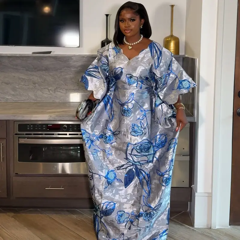 Arwa Brocade Elegant Dress for Women - Blue Floral Design on Gray Fabric with a ruffled sleeve and classic cut for any occasion