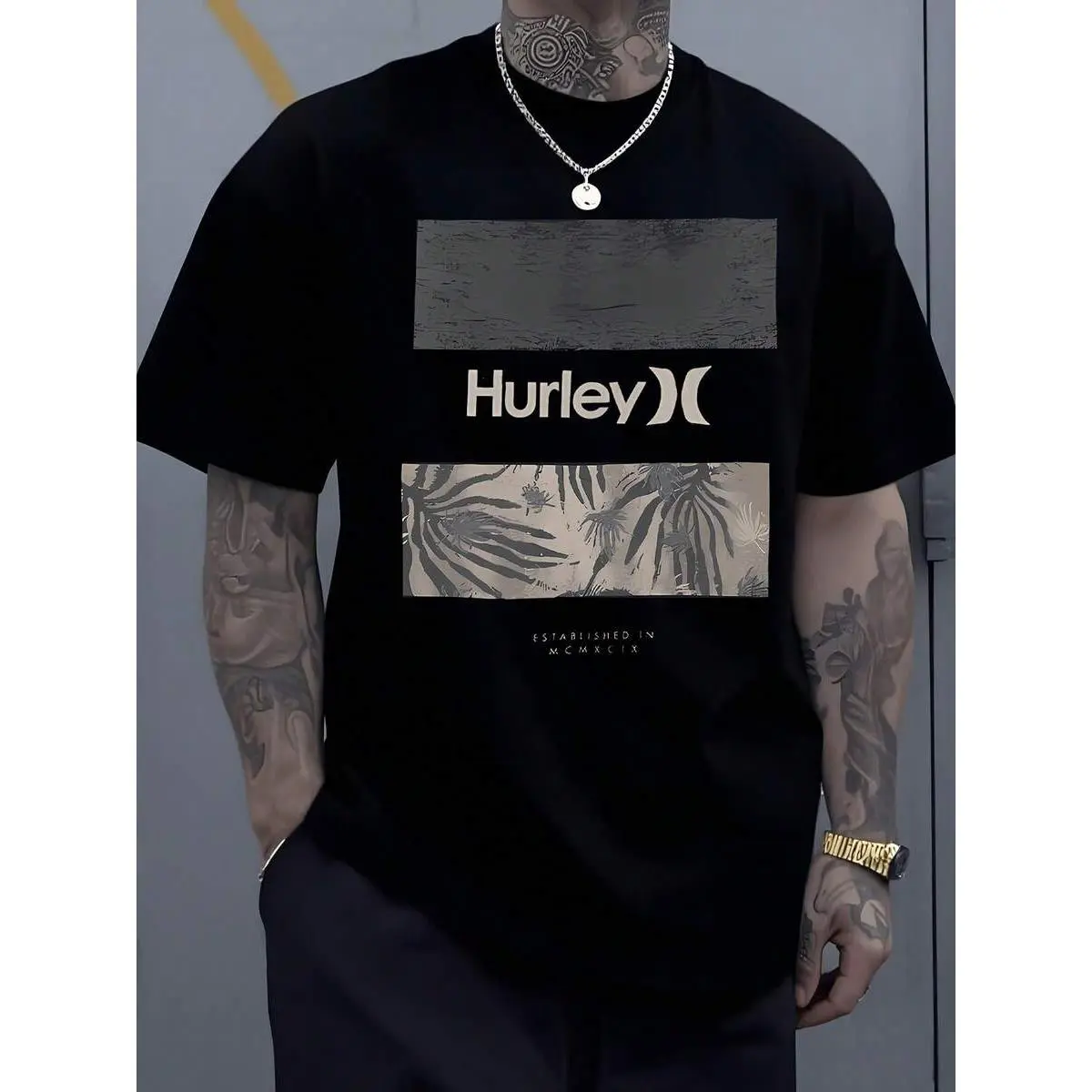 180gTropical Vibes And Hurley Lettering Tshirt, Featuring A Palm Leaf And Floral Motif That Evokes A Relaxed Beach Vacation Getaway, Making It A Cool Addition To Your Casual Wardrobe 100% Cotton