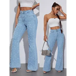 Women’s stylish flared jeans with faux pearl embellishments, high-waisted comfortable stretch denim, washed finish for all seasons, elegant casual look, chic daywear | Modern Chic Jeans | Faux Pearl Detail