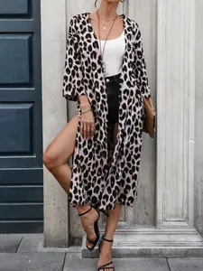 A women's leopard print long-sleeved slit loose-fitting long coat that is versatile, slimming and casual.