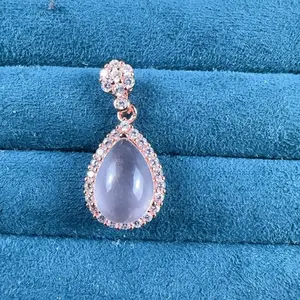 <PingEast jewelry > Rose Quartz 925 sterling silver necklace featuring a rose gold-colored teardrop-shaped pendant with natural pink crystal
