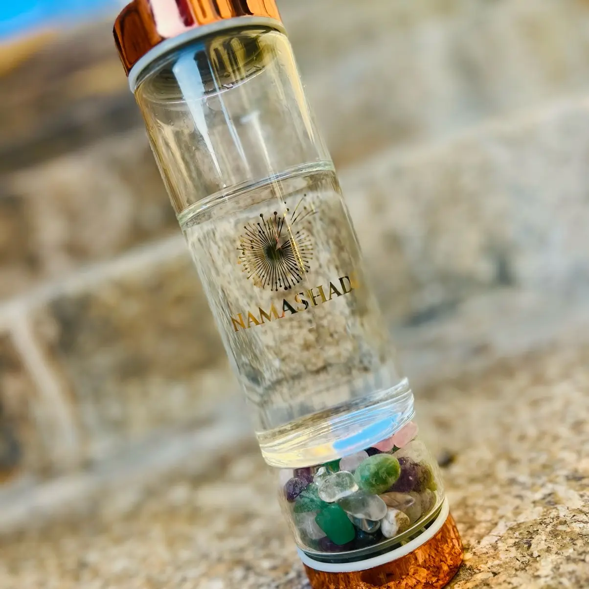 Manifestation crystal water bottle and tea infuser. Great for hot or cold beverages.