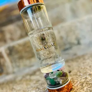 Manifestation crystal water bottle and tea infuser. Great for hot or cold beverages.