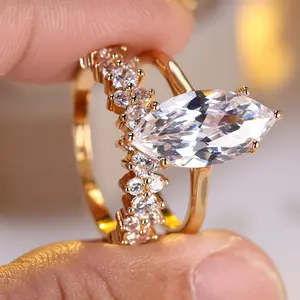 White diamond marquise ring micro-set with white diamonds around the entire band luxurious and trendy fashion ring