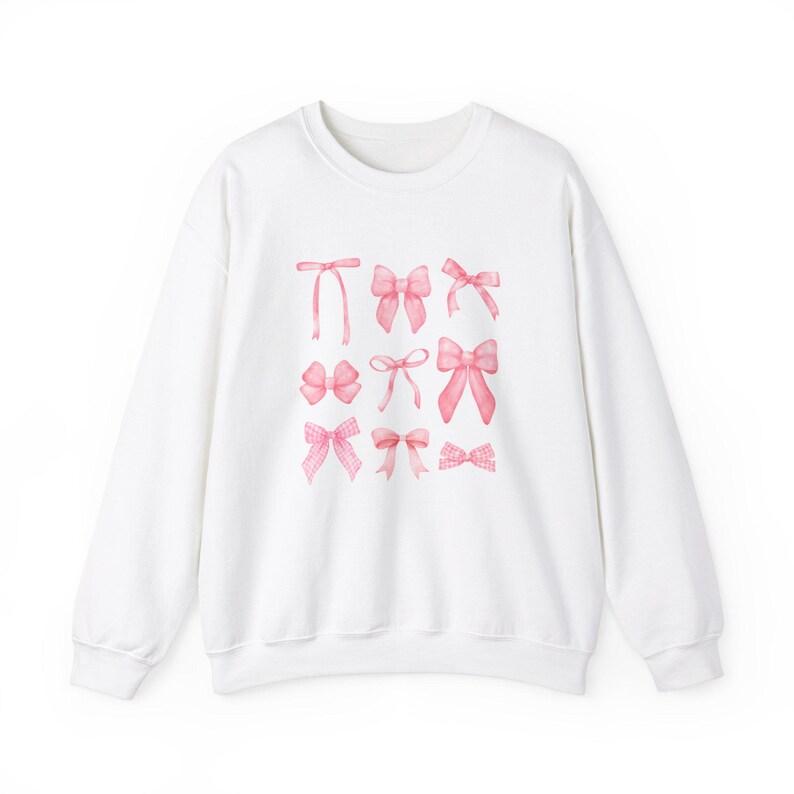 Unisex White Fashion Sweater – Cute Pink Bow Print Design, Soft and Comfortable Fabric, Easy to Style, Perfect for Casual Outings, School, and Streetwear gilmore  girls  merch