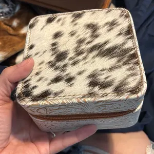 Cowhide and embossed leather travel jewelry box