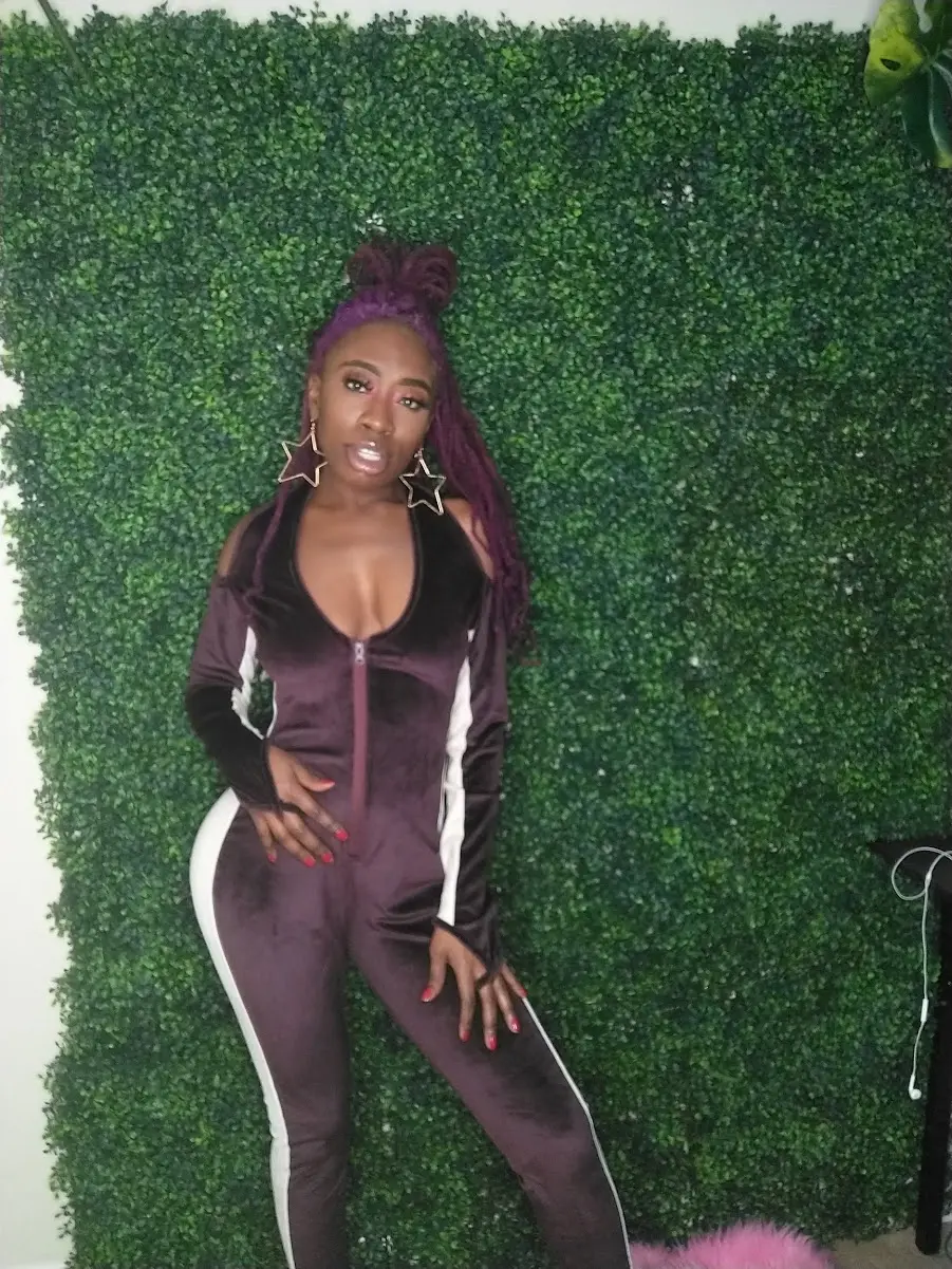 Velvet burgundy jumpsuit with shoulder cut out