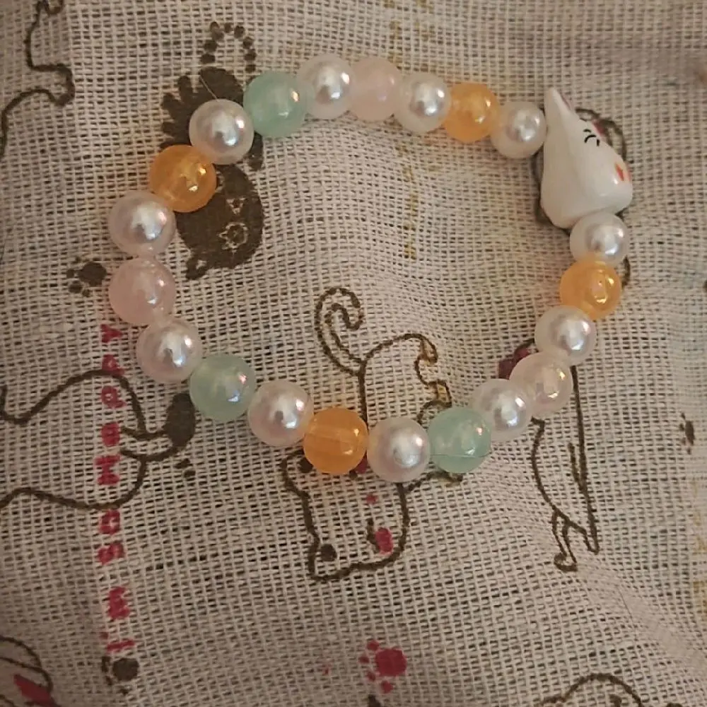 Bunny Blossom Bracelet with Colorful Beads and Adorable Bunny Charm.